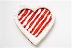 Heart-shaped biscuit with red and white icing