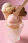 Strawberry, chocolate & vanilla ice cream in cones, ice cream spoon