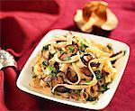 Ribbon pasta with mushrooms and parsley