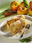 Two pieces of apple strudel with custard