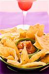 Tortilla chips and salsa in a bowl