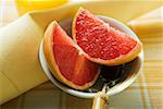 Grapefruit wedges in a bowl