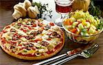 Pizza with vegetables, olives and mince
