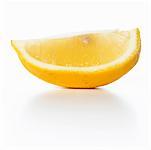 A lemon wedge with white background