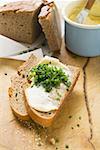 Fresh bread with butter and chives