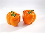 Two orange peppers