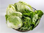 Lettuce, Chinese cabbage & iceberg lettuce in wire basket