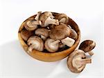Shiitake mushrooms in a wooden bowl