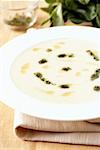 Potato cream soup with pesto