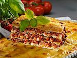 A portion of lasagne on a palette knife