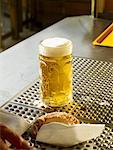 Freshly poured draught beer on bar counter