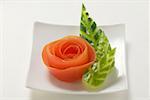 Tomato rose and carved cucumber leaves