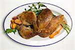 Roast goose pieces with garlic and herbs