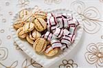 Two kinds of sweets on heart- shaped plate