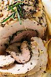 Roast turkey roll with herbs (close-up)