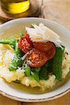 Mashed potato with mangetout, tomatoes, Parmesan, olive oil