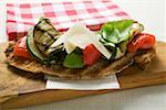 Crostini with grilled vegetables, Parmesan and basil