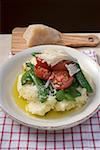 Mashed potato with mangetout, tomatoes and Parmesan