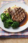 Pork chop with broccoli and mashed potato