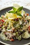 Couscous salad with vegetables, lemon and mint