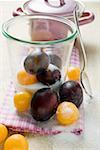 Plums, mirabelles, sugar, jam jar pan