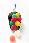 Coloured jelly sweets in metal scoop