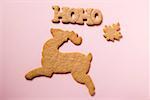 Gingerbread biscuits for Christmas (reindeer, word, leaf)