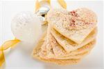 Almond hearts with sugar, in a pile, Christmas bauble