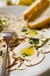 Cep carpaccio with olive oil and herbs