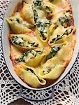 Baked pasta shells with spinach filling