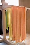 Home-made pasta, hanging up to dry