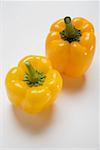 Two yellow peppers