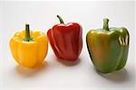 Three peppers (yellow, red, green)