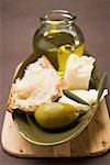 Green olive, white bread, Parmesan and olive oil