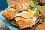 Lahmacum (Turkish pizza) with sheep's cheese filling