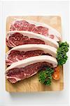 Sirloin steaks on chopping board