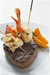 Surf and Turf (beef steak with prawns on cocktail sticks)