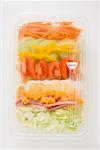 Iceberg lettuce, ham, cheese, egg & vegetables in plastic tray