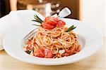 Spaghetti with tomatoes and rosemary