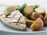 Grilled cod steak with potatoes