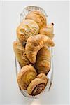 Bread rolls and sweet pastries in bread basket