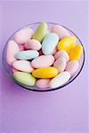 Sugared almonds in glass bowl