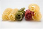 Coloured riccioli in a row