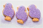 Three Easter biscuits (purple chicks)
