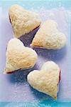 Heart-shaped jam-filled biscuits with sugar