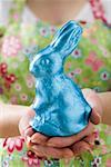 Woman holding Easter Bunny in blue foil
