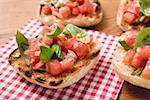 Bruschetta with tomato salsa and basil