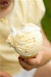 Child holding an ice cream cone