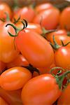 Cherry tomatoes in woodchip basket (detail)