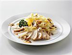 Chicken breast with white wine sauce, mushrooms & tagliatelle